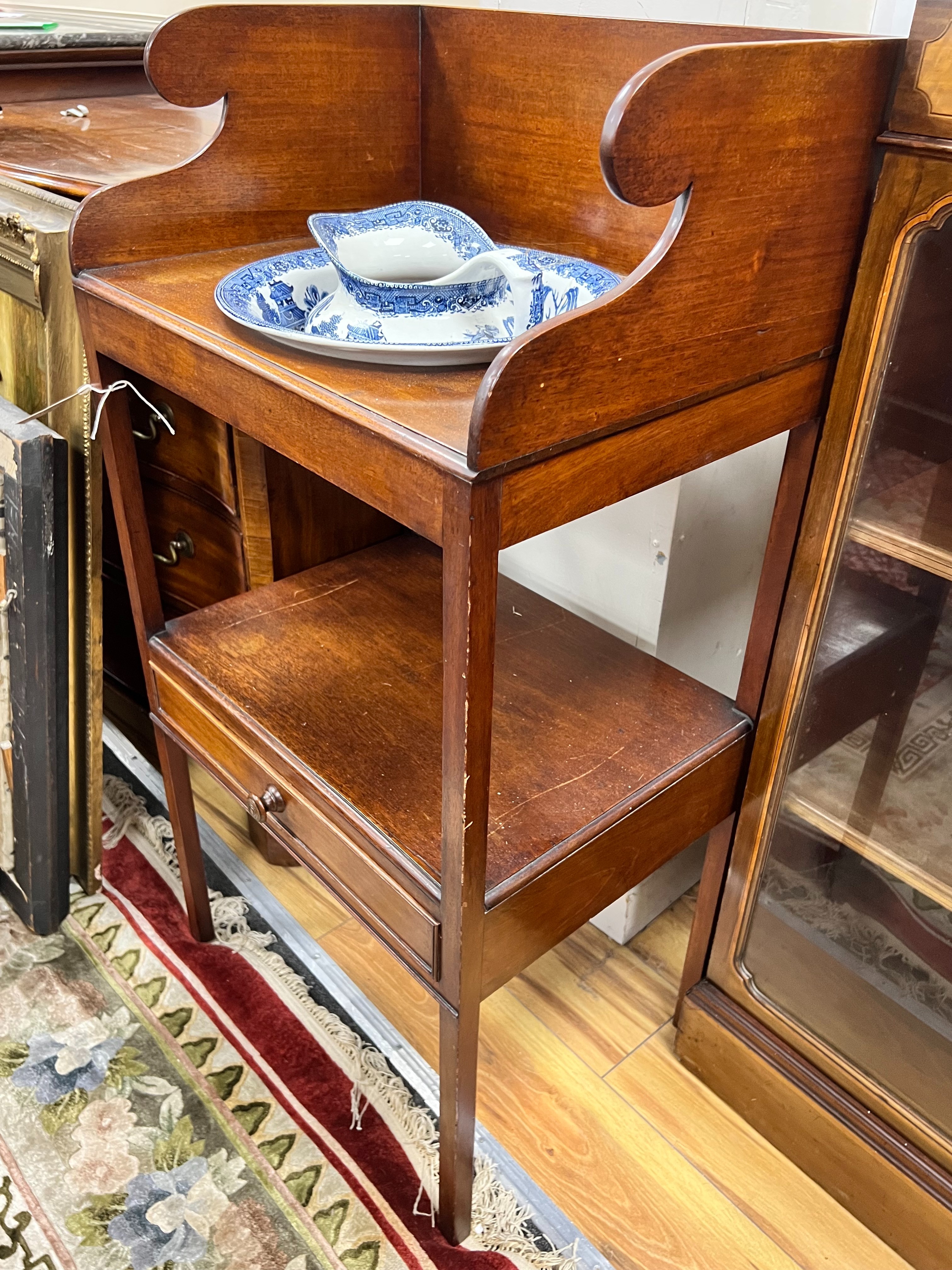 A Regency mahogany two tier washstand, together with a Staffordshire blue and white jug and basin, width 50cm depth 38cm height 101cm